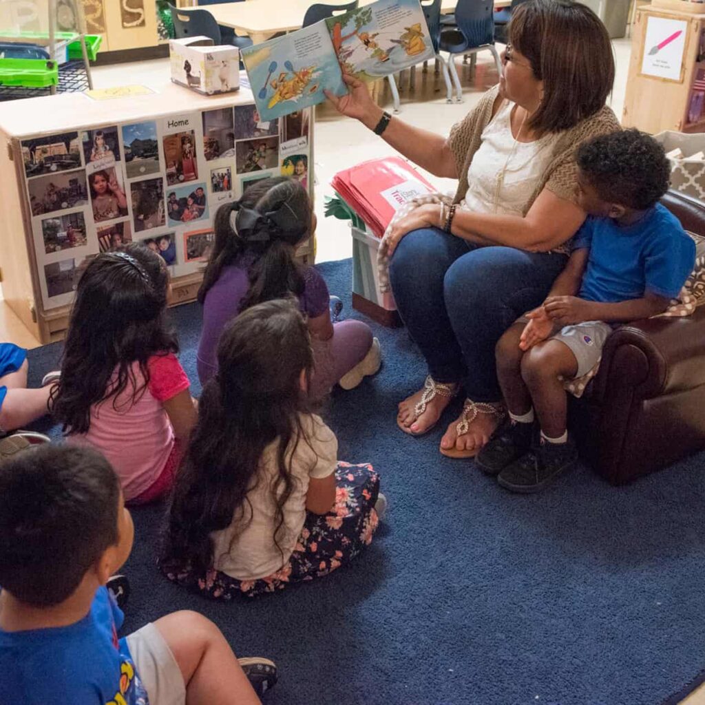 reading-educator-children an educator reads to toddlers in a Pre-K 4 SA classroom