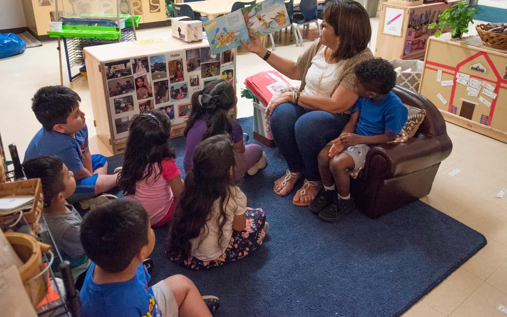an educator reads to toddlers in a Pre-K 4 SA classroom