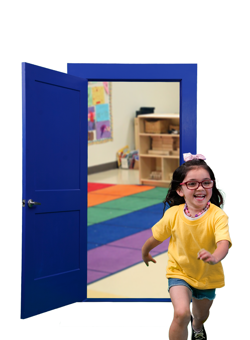 a young girl smiles while running through a blue door