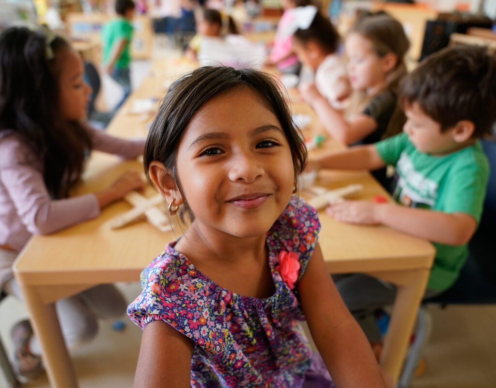Pre-K for SA - Smile a young girl smiles into the camera