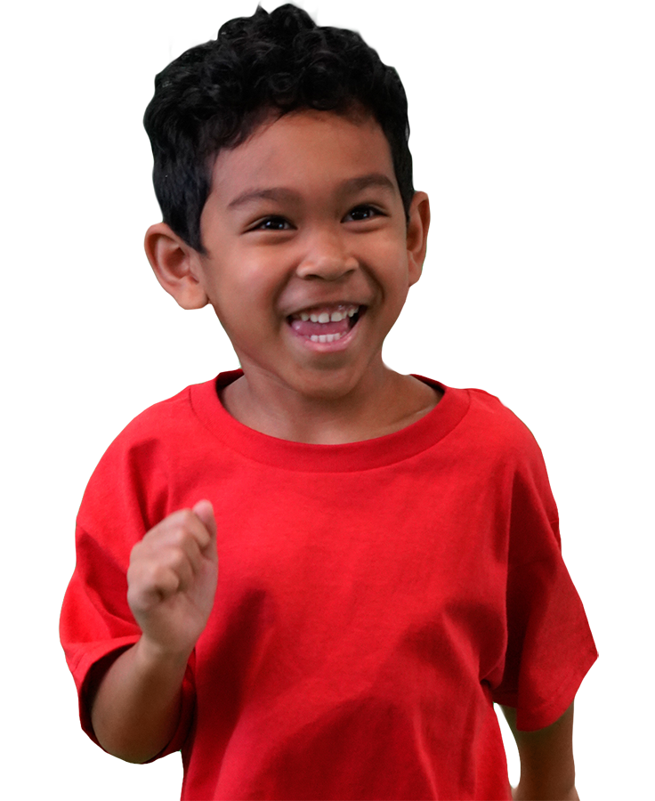 a young boy in a red shirt smiles