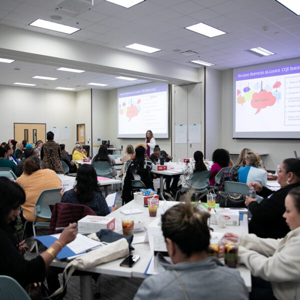 Room of engaged early education professionals