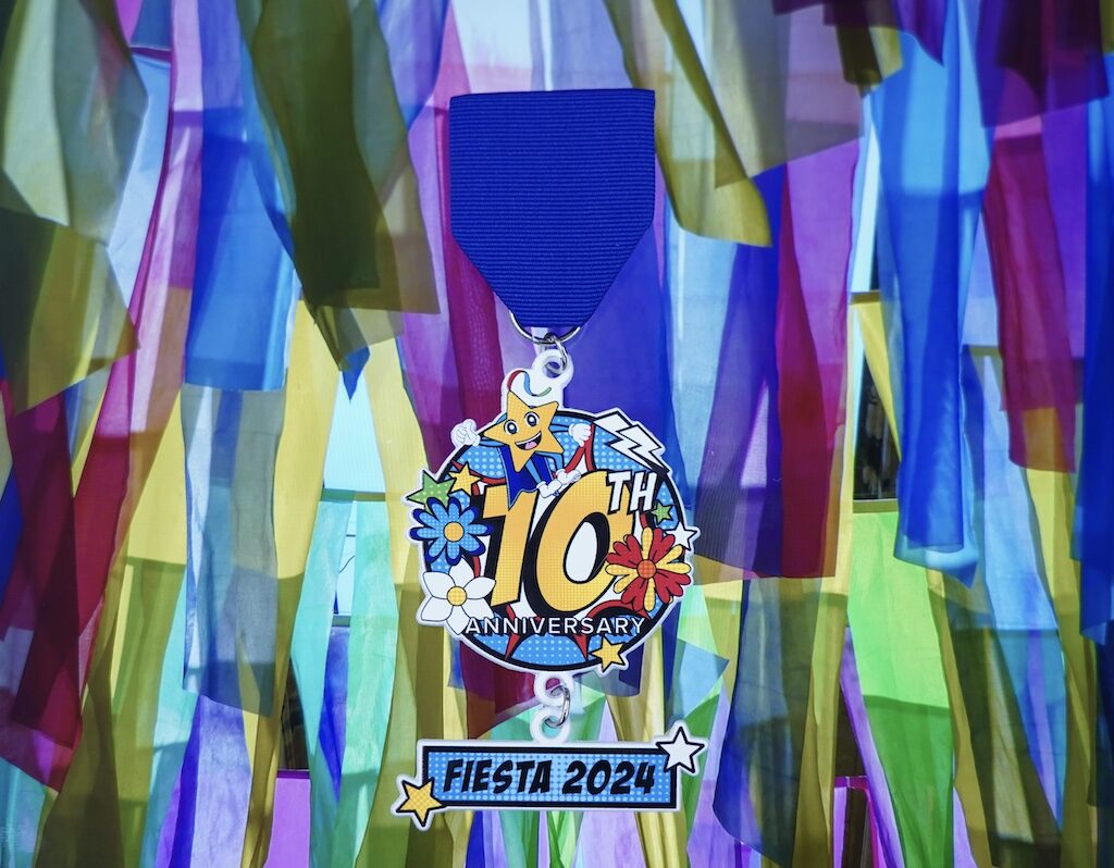 a Fiesta medal celebrating the 10th anniversary of Pre-K 4 SA