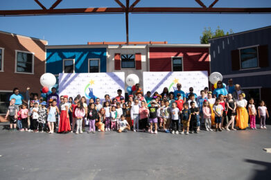 Reunion Group Pre-K 4 SA children and teachers during a school event outdoors