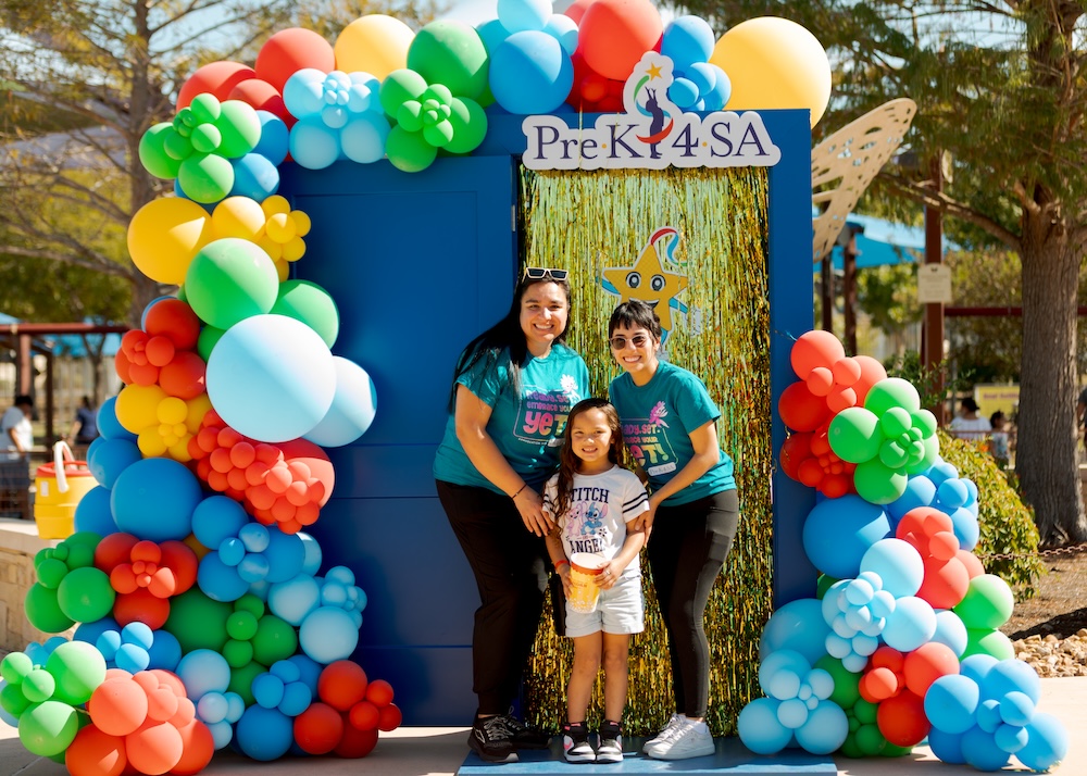 pre k4 sa door at family reunion a family poses for a photo in front of a blue pre k 4 sa door