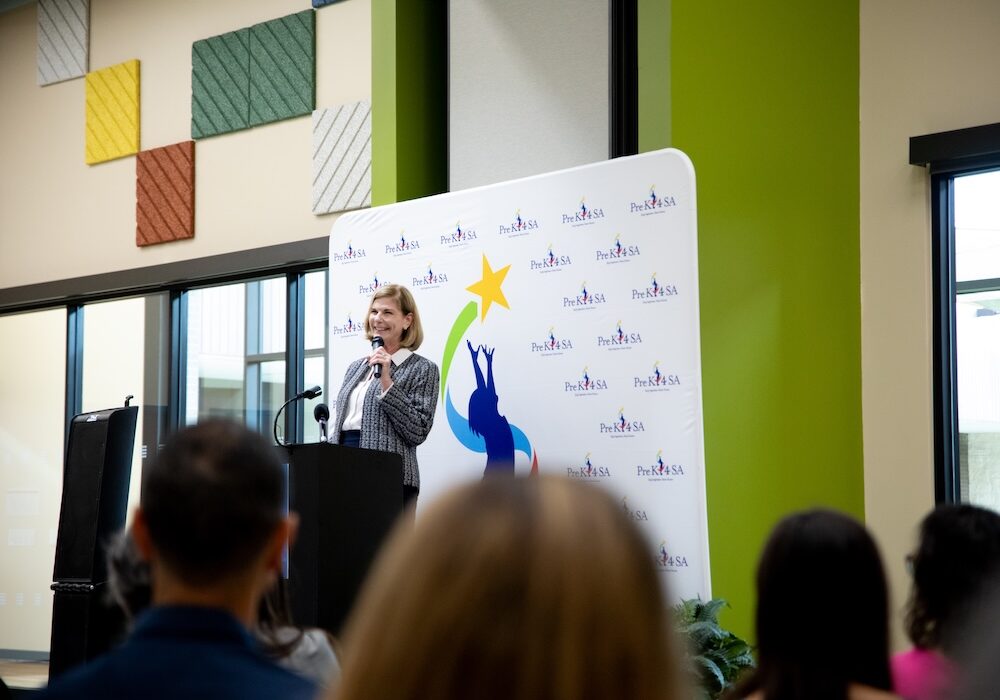 Dr. Sara Baray speaks at a podium